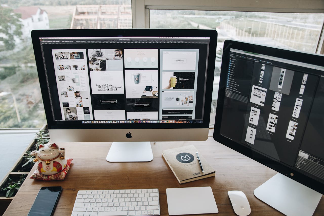 Crafting Captivating Headlines: Your awesome post title goes here A well-organized workspace showcasing dual Apple iMacs on a wooden desk ideal for design and productivity.